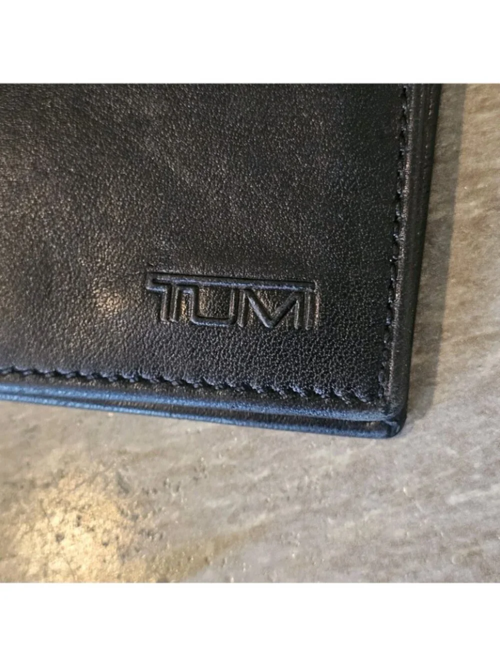 Tumi black leather